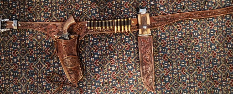 Carved Western/Cowboy Holster with matching Gun Belt and Knife Sheath